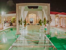Acrylic ceremony setup on top of swimming pool on the beautiful island of Aruba